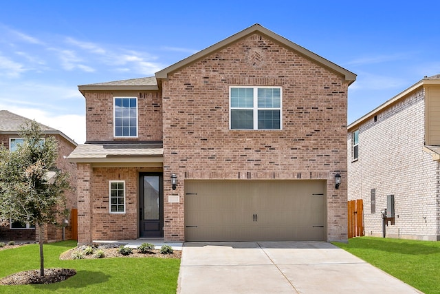 1105 Dye Blvd, Princeton, TX 75407 - view of front of house with brick siding, driveway, a front yard, and a garage