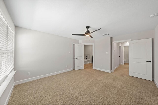 1105 Dye Blvd, Princeton, TX 75407 - unfurnished bedroom featuring baseboards, light carpet, a ceiling fan, and visible vents