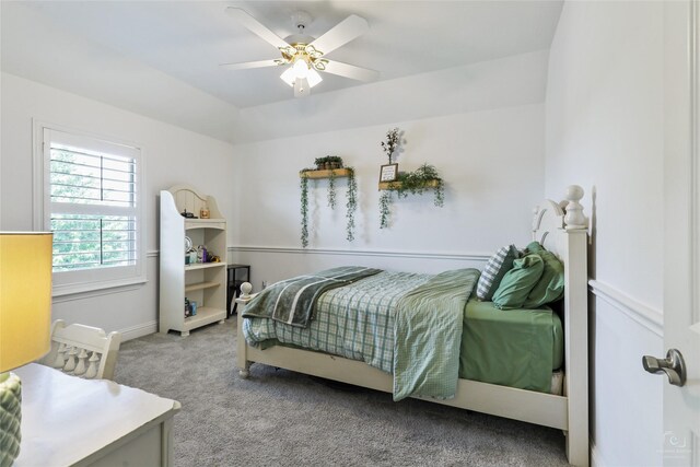 bedroom featuring carpet, ceiling fan, and baseboards