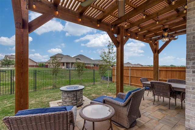 view of patio with a pergola, ceiling fan, outdoor dining area, and a fenced backyard