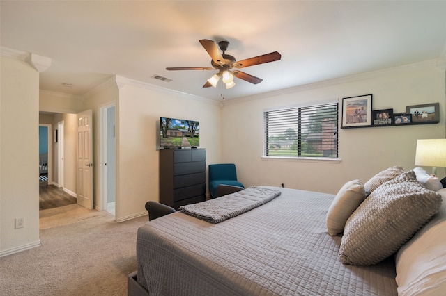 1600 Skyview Dr, Irving, TX 75060 - carpeted bedroom featuring visible vents, ornamental molding, baseboards, and ceiling fan