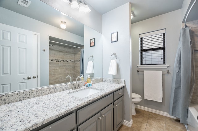1600 Skyview Dr, Irving, TX 75060 - bathroom featuring tile patterned flooring, vanity, toilet, baseboards, and visible vents
