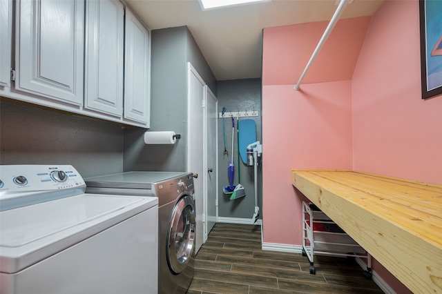 1600 Skyview Dr, Irving, TX 75060 - laundry area with baseboards, cabinet space, washing machine and dryer, and dark wood-style floors
