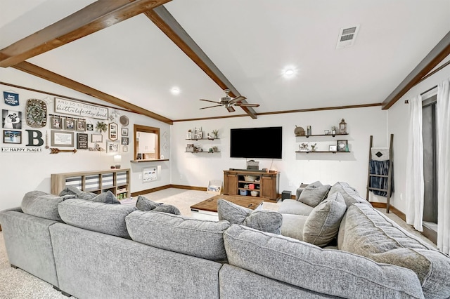 carpeted living room with baseboards, vaulted ceiling with beams, a ceiling fan, and visible vents