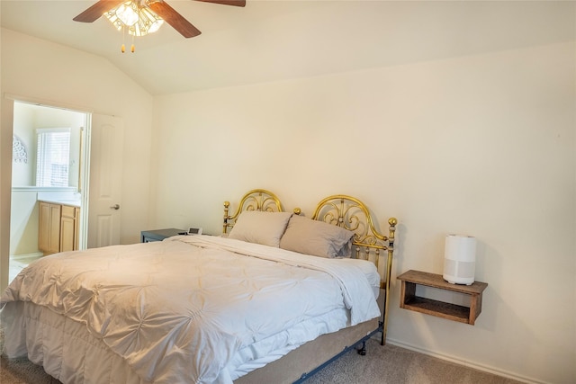 carpeted bedroom featuring baseboards, a ceiling fan, and vaulted ceiling