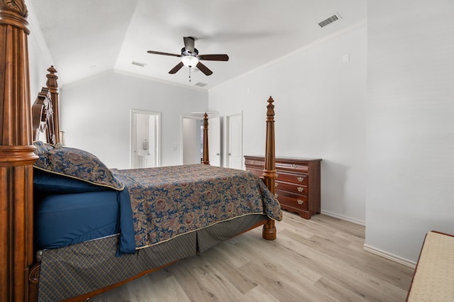 bedroom with visible vents, ornamental molding, light wood-style floors, and baseboards