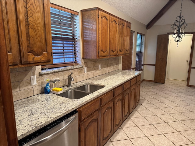 kitchen with a sink, lofted ceiling with beams, backsplash, and dishwasher