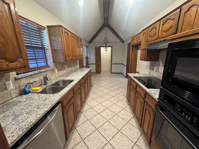 kitchen featuring a sink, under cabinet range hood, black appliances, and tasteful backsplash