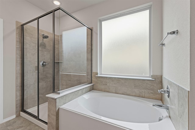 3819 Elkhorn Ln, Forney, TX 75126 - bathroom featuring a stall shower and a garden tub