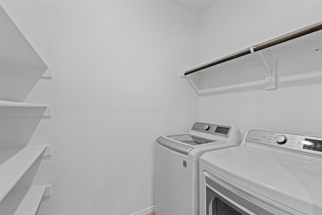 3819 Elkhorn Ln, Forney, TX 75126 - clothes washing area with washing machine and dryer