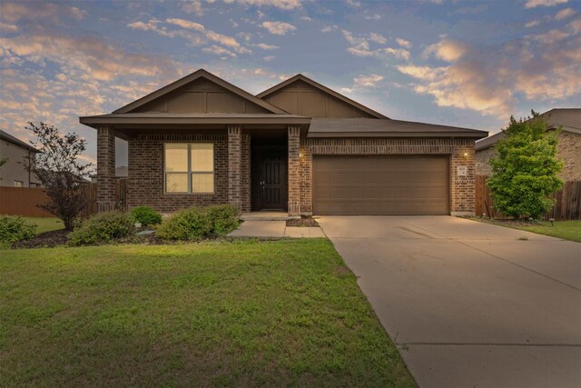 3819 Elkhorn Ln, Forney, TX 75126 - single story home featuring brick siding, an attached garage, concrete driveway, and board and batten siding