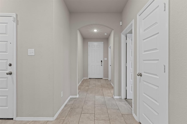 3819 Elkhorn Ln, Forney, TX 75126 - hallway featuring arched walkways, baseboards, and recessed lighting