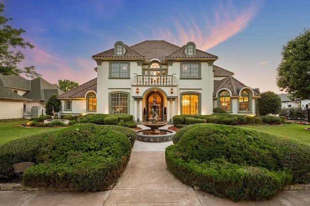 5404 Miramar Ln, Colleyville, TX 76034 - mediterranean / spanish-style home featuring a balcony, stucco siding, and a tile roof