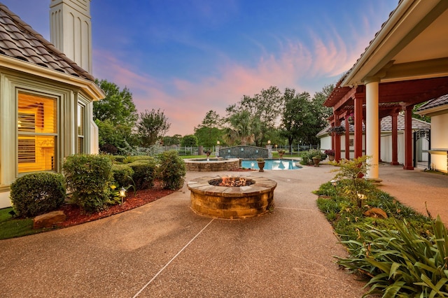 5404 Miramar Ln, Colleyville, TX 76034 - view of patio / terrace featuring a fire pit