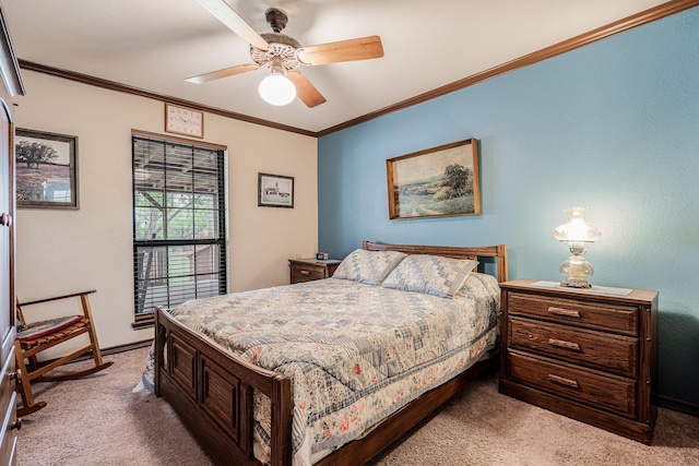 bedroom featuring crown molding, baseboards, ceiling fan, and light carpet