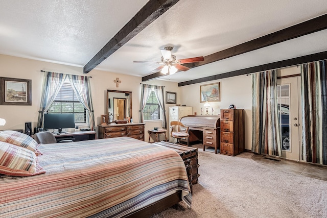 bedroom featuring carpet flooring, a textured ceiling, beam ceiling, and multiple windows