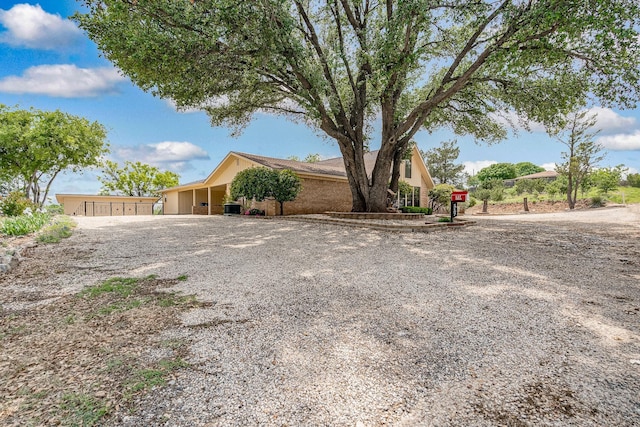 view of front of property featuring driveway