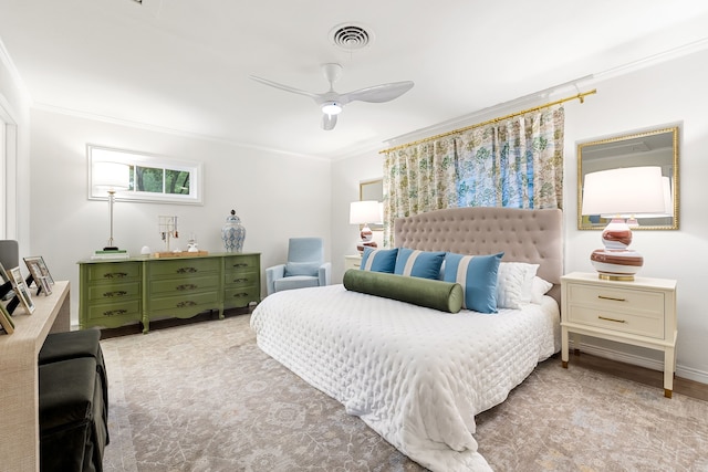 bedroom with visible vents, ornamental molding, and ceiling fan