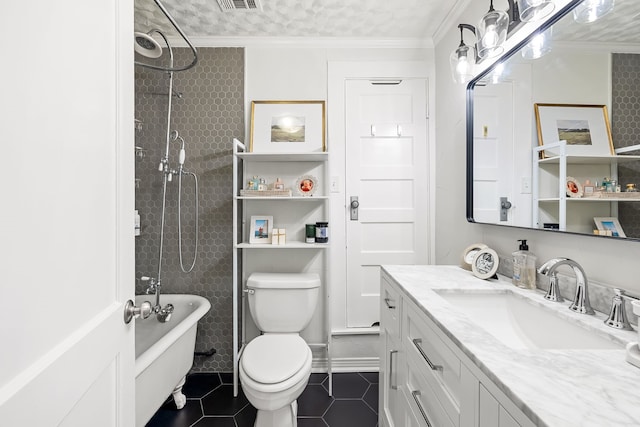 bathroom featuring crown molding, tile patterned floors, vanity, and toilet