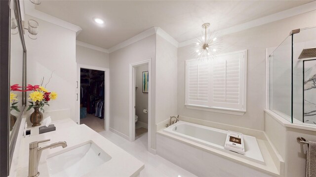 bathroom featuring crown molding, a sink, toilet, a bath, and a stall shower