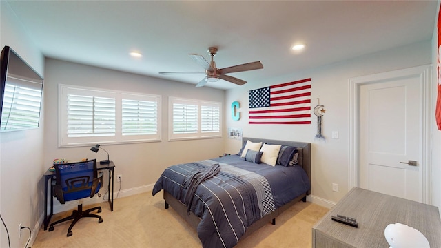 bedroom featuring baseboards, recessed lighting, and light colored carpet