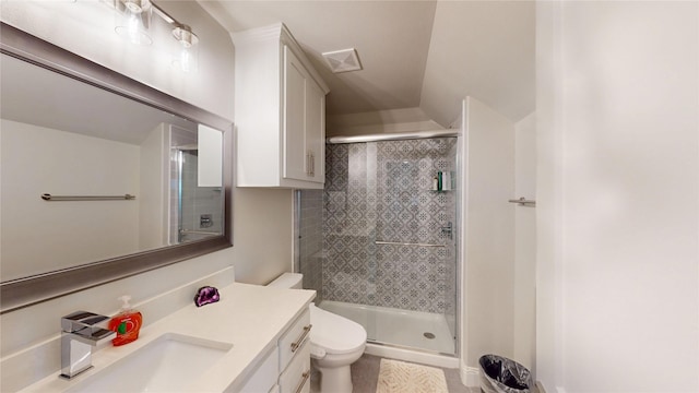 bathroom featuring vanity, toilet, decorative backsplash, visible vents, and a stall shower