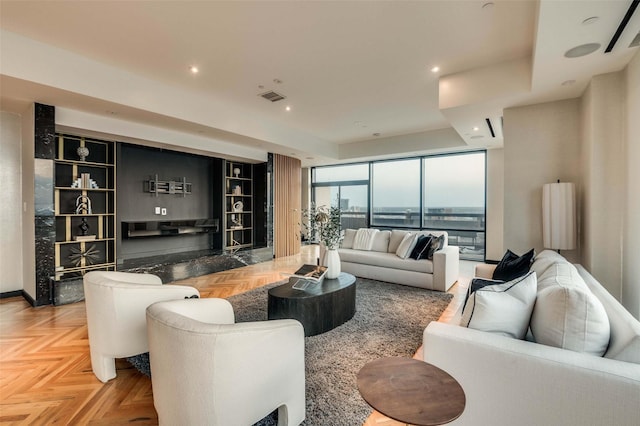 3111 Welborn St Unit 1703, Dallas, TX 75219 - living room featuring recessed lighting, built in shelves, and visible vents