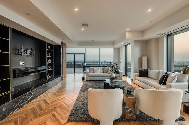 3111 Welborn St Unit 1703, Dallas, TX 75219 - living area with visible vents, recessed lighting, floor to ceiling windows, and a wealth of natural light
