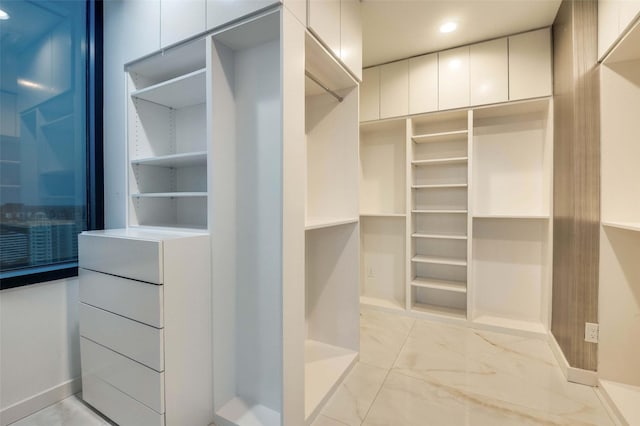 3111 Welborn St Unit 1703, Dallas, TX 75219 - spacious closet featuring marble finish floor