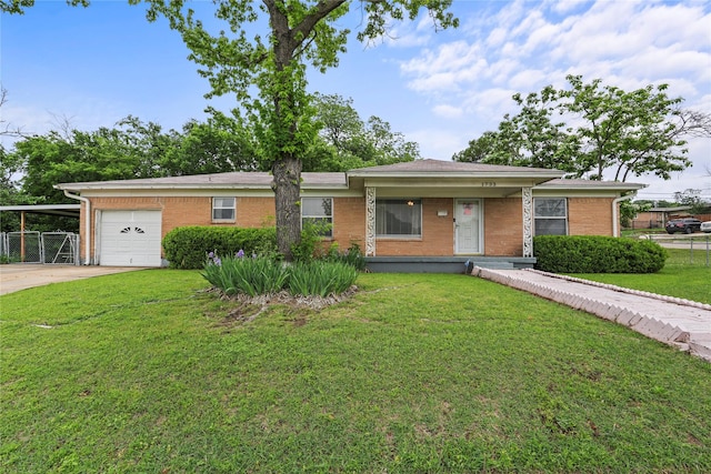 1733 Ransom Ter, Fort Worth, TX 76112 - single story home featuring brick siding, a garage, an attached carport, a front yard, and concrete driveway