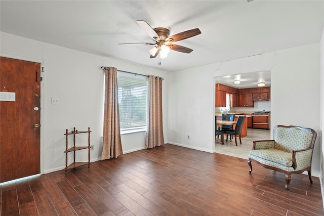 1733 Ransom Ter, Fort Worth, TX 76112 - entrance foyer featuring baseboards, ceiling fan, and wood finished floors