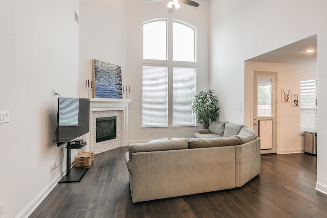 6256 Whitebrush Pl, Fort Worth, TX 76123 - living room with a high ceiling, a wealth of natural light, ceiling fan, and a stone fireplace