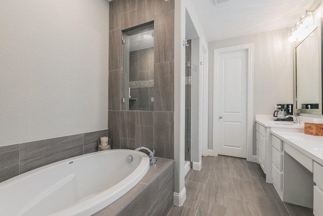 6256 Whitebrush Pl, Fort Worth, TX 76123 - bathroom featuring vanity, a stall shower, baseboards, and a bath