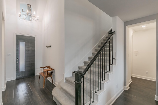 6256 Whitebrush Pl, Fort Worth, TX 76123 - entrance foyer with stairs, baseboards, a chandelier, and dark wood-type flooring