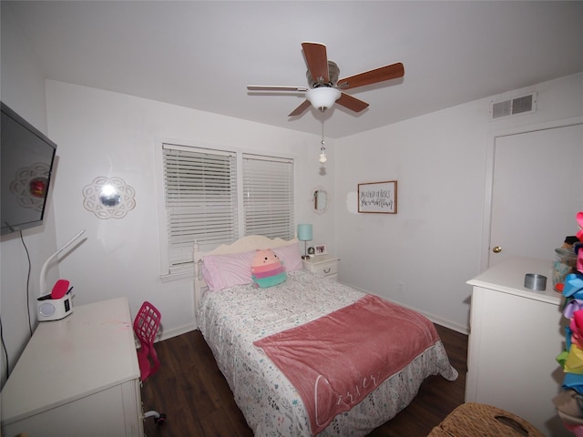 1346 Hillcrest Dr, Graham, TX 76450 - bedroom with baseboards, a ceiling fan, dark wood-style floors, and visible vents