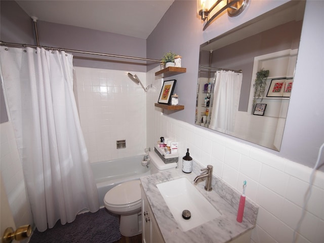 1346 Hillcrest Dr, Graham, TX 76450 - full bathroom with toilet, tile walls, shower / bath combination with curtain, and vanity