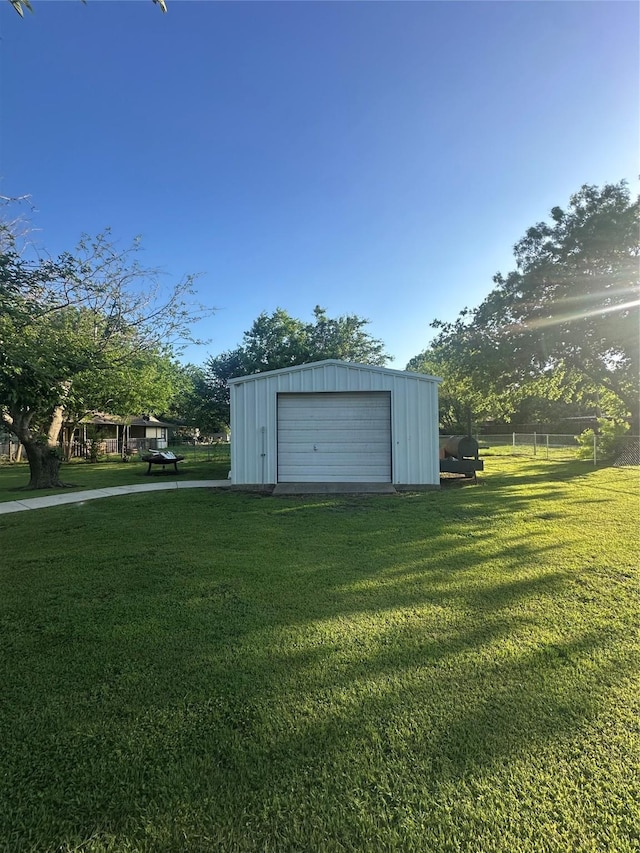 1346 Hillcrest Dr, Graham, TX 76450 - view of outdoor structure with fence and an outbuilding