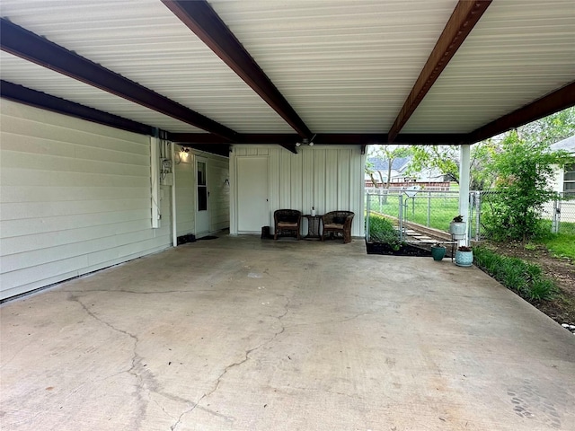 1346 Hillcrest Dr, Graham, TX 76450 - view of patio featuring fence and a carport