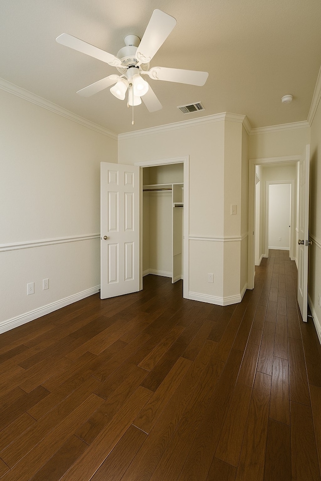 4605 Stargazer Dr, Plano, TX 75024 - unfurnished bedroom with crown molding, dark wood-style flooring, a ceiling fan, baseboards, and visible vents