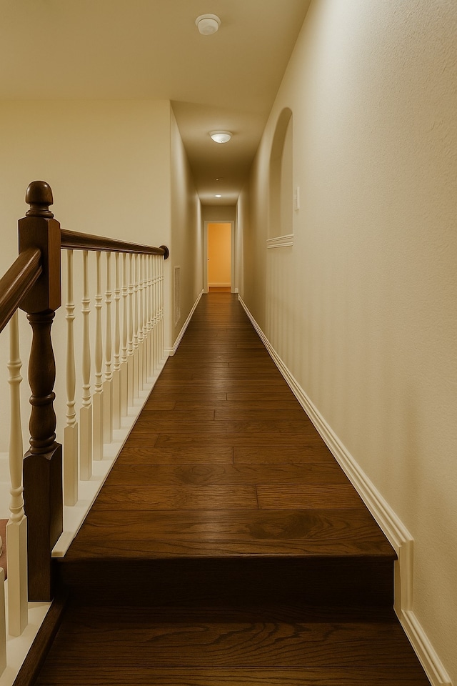 4605 Stargazer Dr, Plano, TX 75024 - hallway with baseboards, dark wood-style flooring, and visible vents
