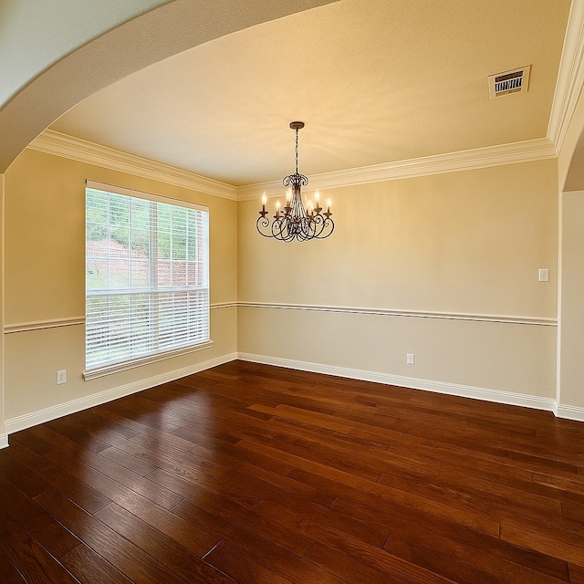 4605 Stargazer Dr, Plano, TX 75024 - unfurnished room with visible vents, arched walkways, hardwood / wood-style flooring, baseboards, and a chandelier
