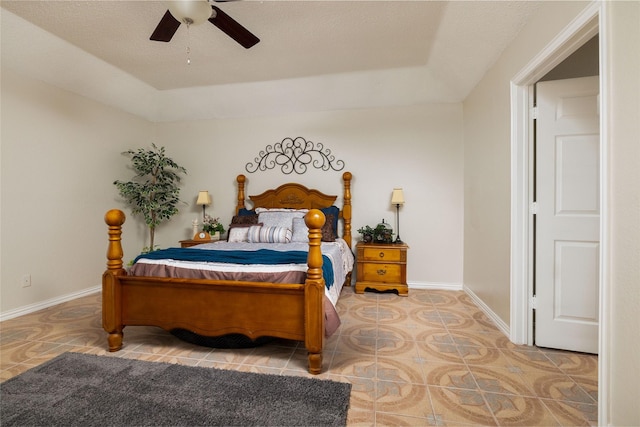 bedroom with baseboards and ceiling fan