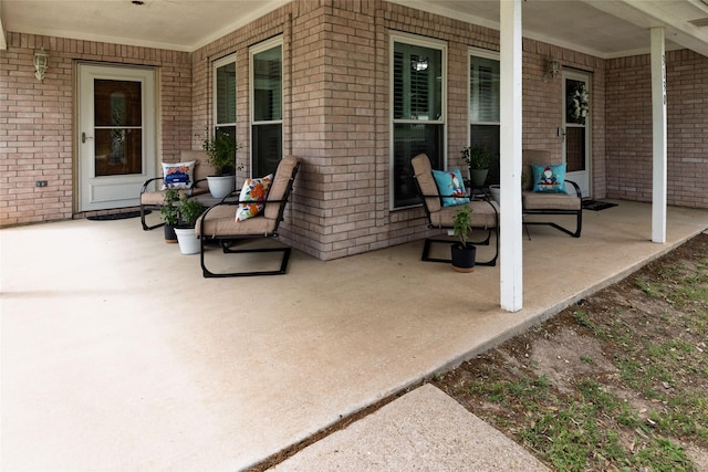 view of patio featuring a porch