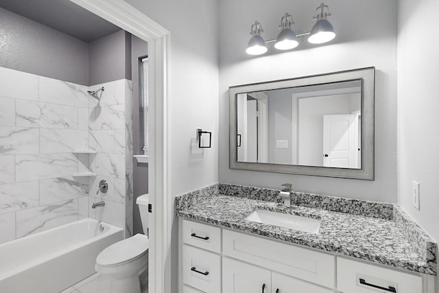 bathroom featuring shower / bath combination, vanity, and toilet
