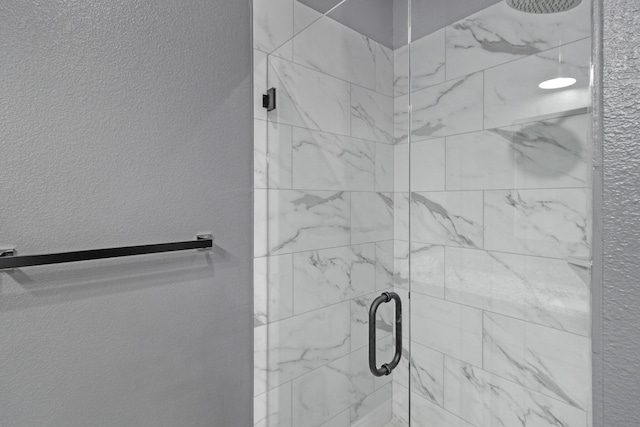 bathroom featuring a stall shower