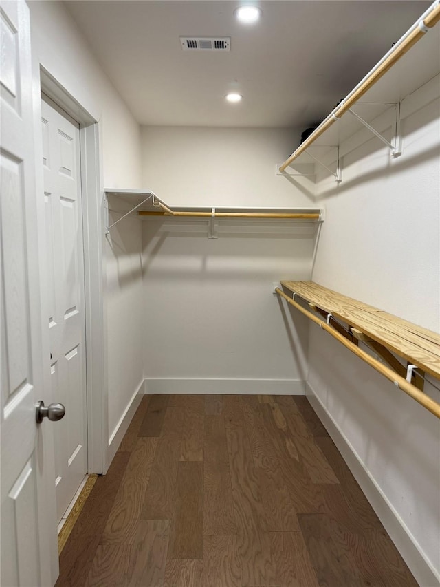 433 Fieldwood Dr, Richardson, TX 75081 - spacious closet featuring dark wood-style flooring