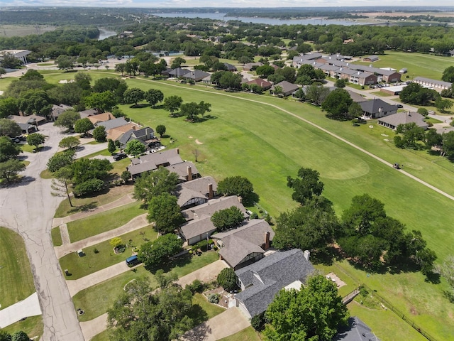 bird's eye view with a water view, golf course view, and a residential view