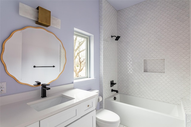 bathroom with vanity, toilet, and shower / tub combination
