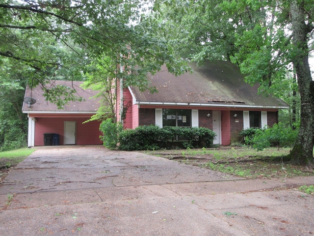4231 Scenic Dr, Shreveport, LA 71119 - view of front of property featuring aphalt driveway and a carport