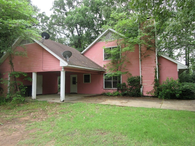 4231 Scenic Dr, Shreveport, LA 71119 - view of front of house featuring a chimney, a patio area, and a front yard